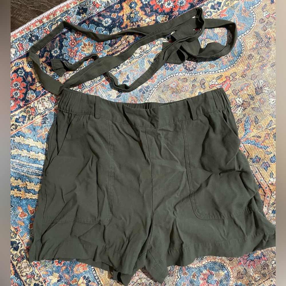 Green linen shorts with tie belt